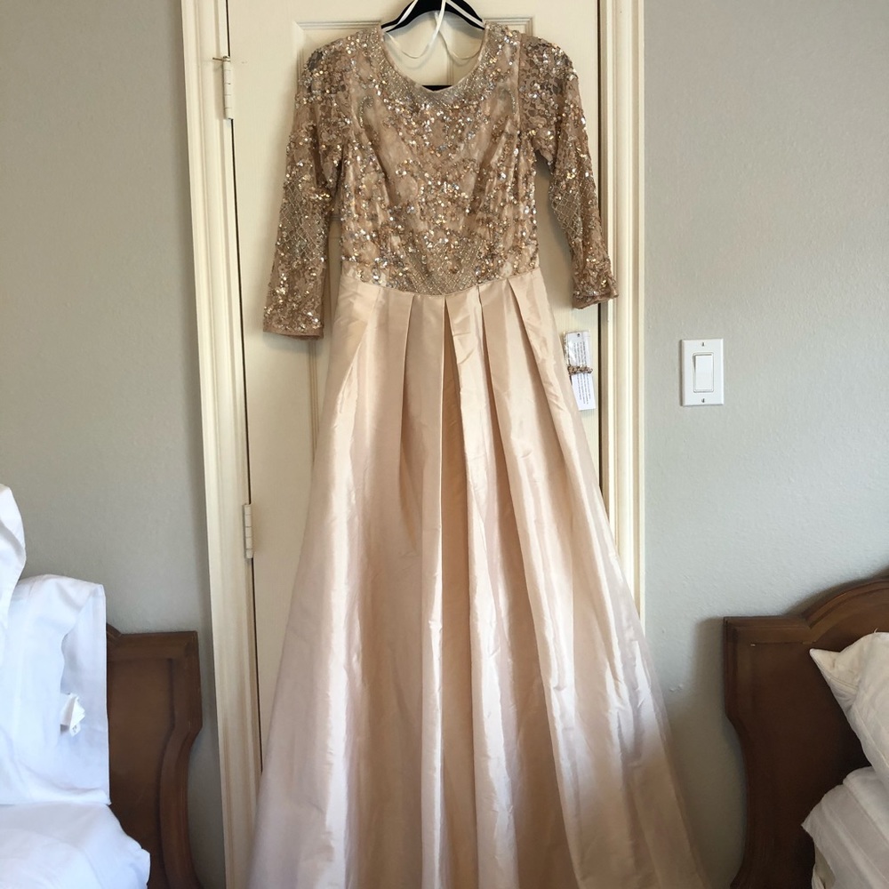 A long pink beaded dress